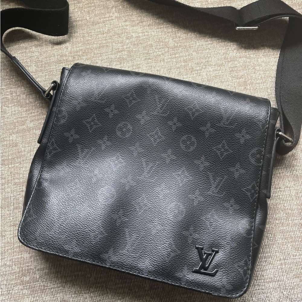 Louis Vuitton Black Messenger Bag with Monogram Design